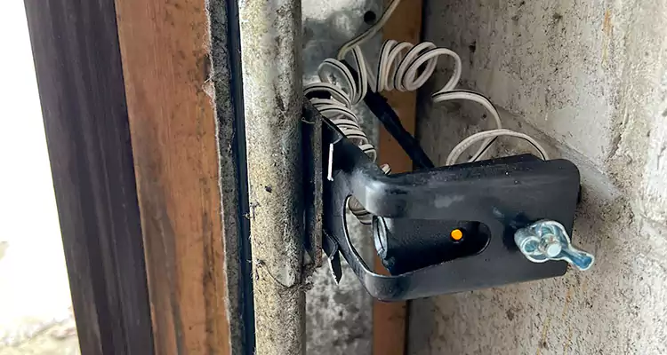 Fix Broken Garage Door Sensor in Ives Estates, FL