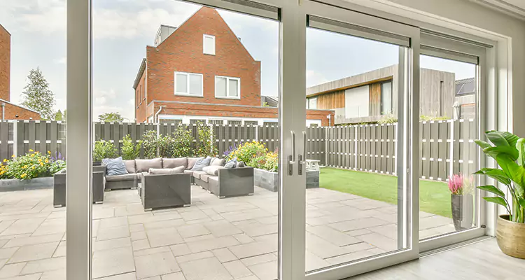 Impact Glass Sliding Patio Doors Repair in Ives Estates, FL